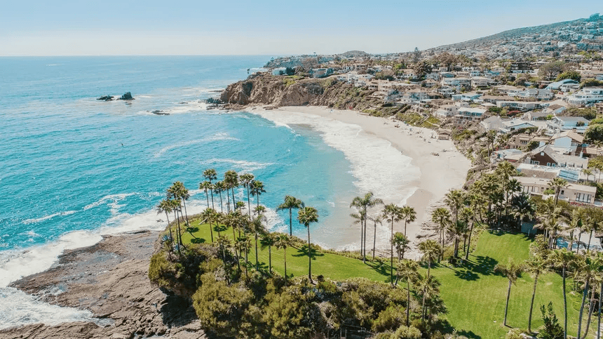 Aerial view of Laguna Beach coastline showing luxury homes and oceanfront neighborhoods